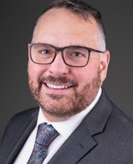 A photo of Senior Vice President of Chief Commercial Officer, Ian K. Anderson