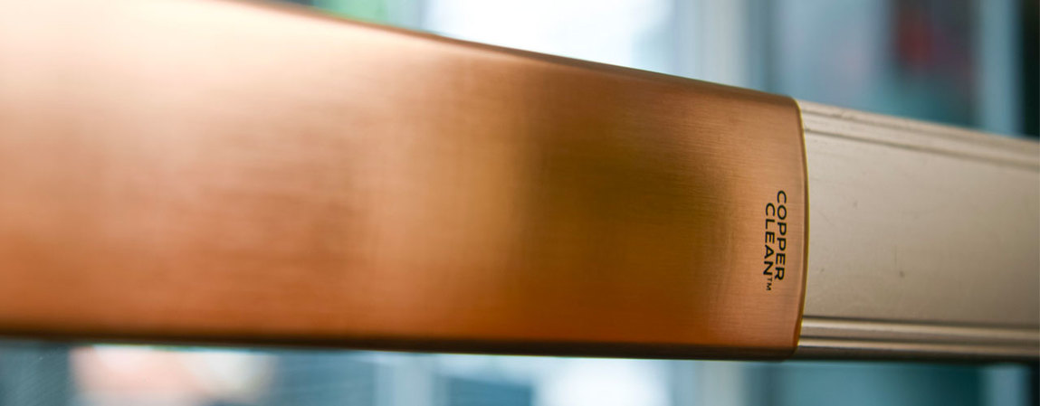 Did You Know? Close-up of a metal bar with 'Copper Clean' engraved on it, background slightly blurred.